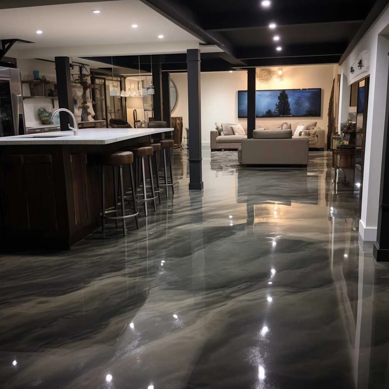 Glossy silver and charcoal metallic epoxy flooring in a modern basement.