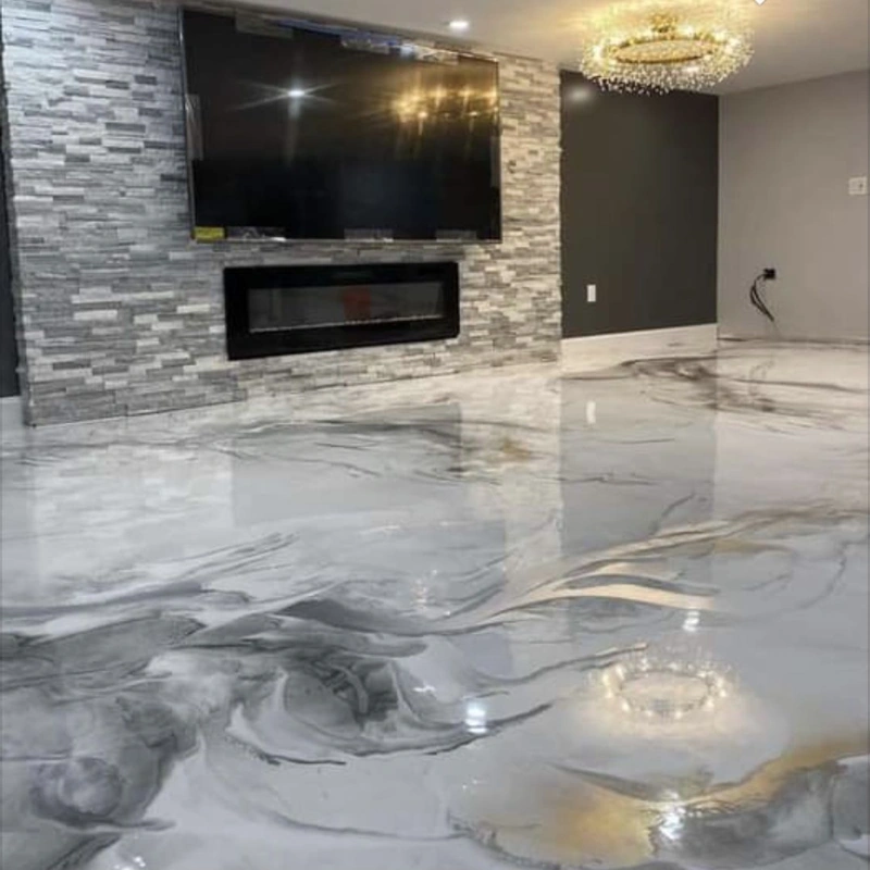 High-gloss white and grey metallic epoxy flooring in a modern living room.